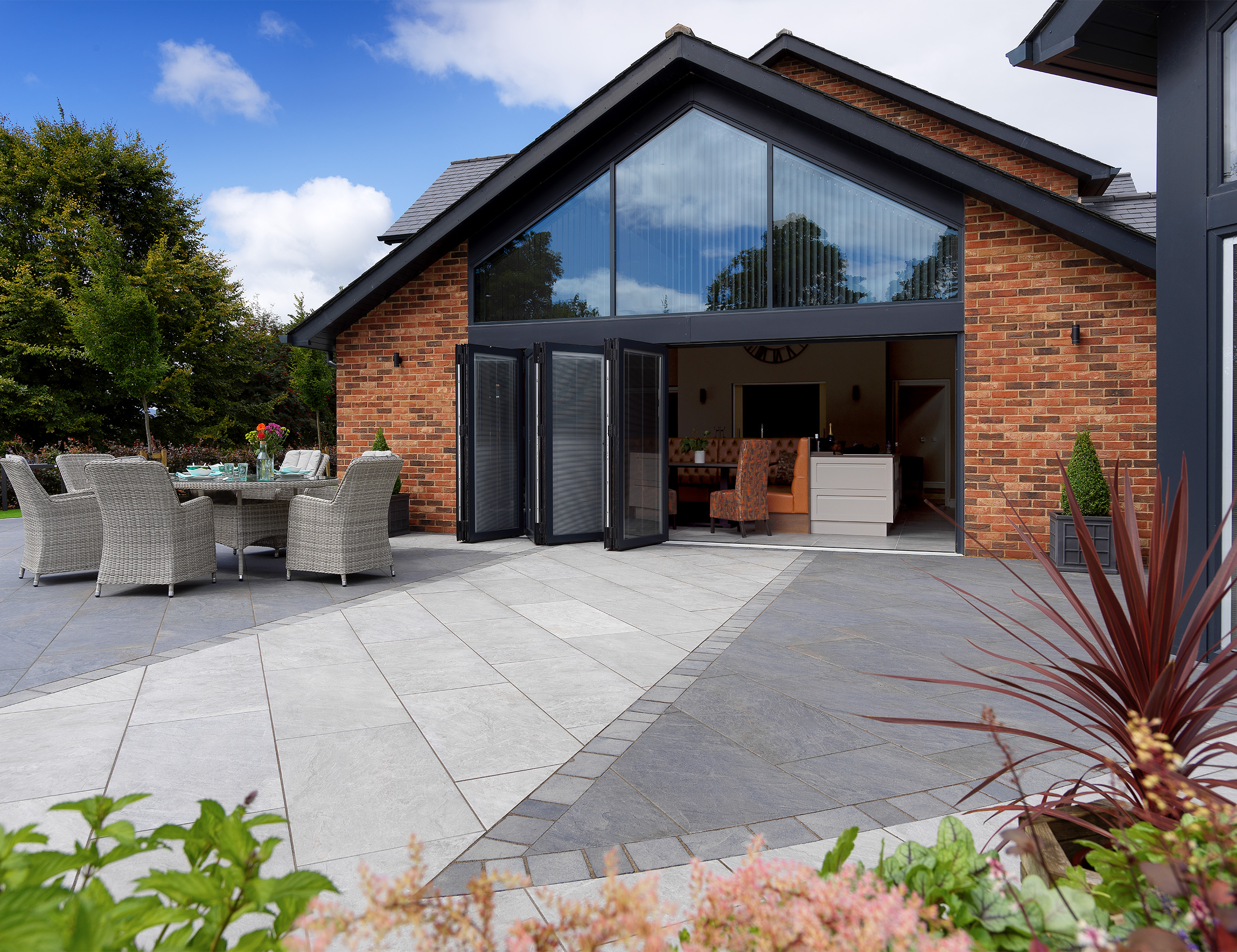 Modern porcelain patio with furniture
