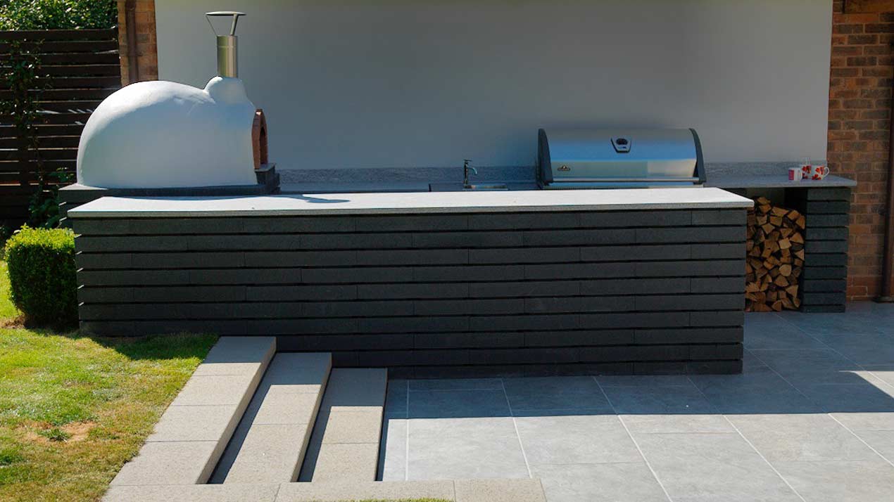 Outdoor Kitchen with Pizza Oven & Grill - Dolomite Grey Paving & Moodul Walling Modular Kitchen Units