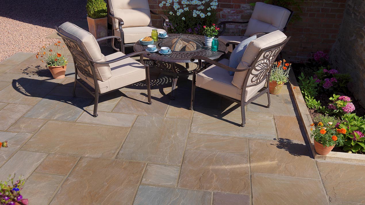 Wide jointed Cloister Flagstones where the slabs have a tumbled/time-worn edge-profile.