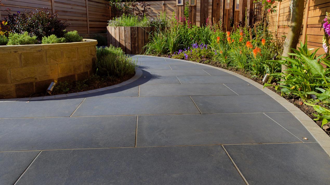 Narrow jointed Dolomite Slate Porcelain paving.