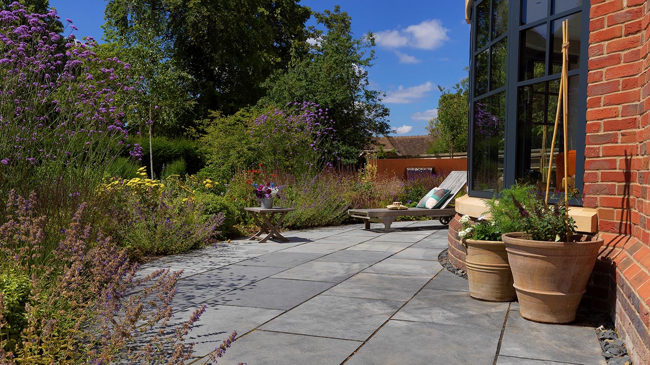 Standard jointed pointing used here with Kadapha Black Limestone paving slabs with a sawn edge-finish.