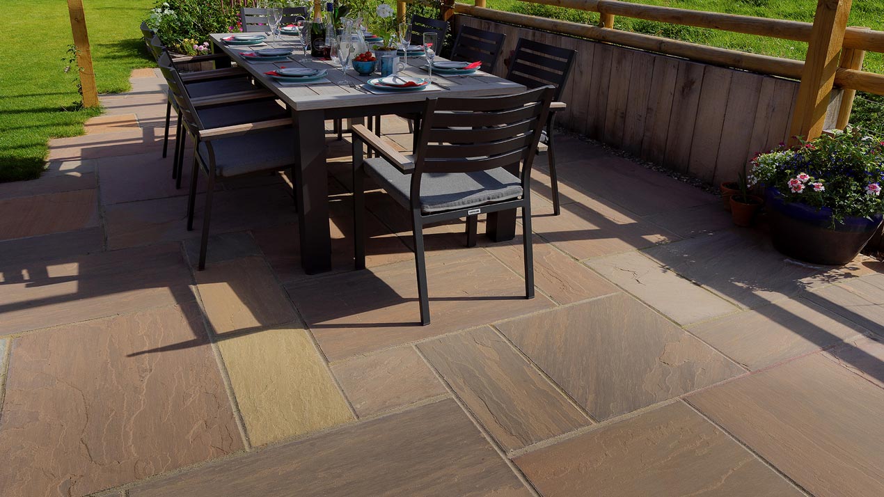 Standard jointed Raj Blend Sandstone patio where the slabs have a hand-cut edge-profile.