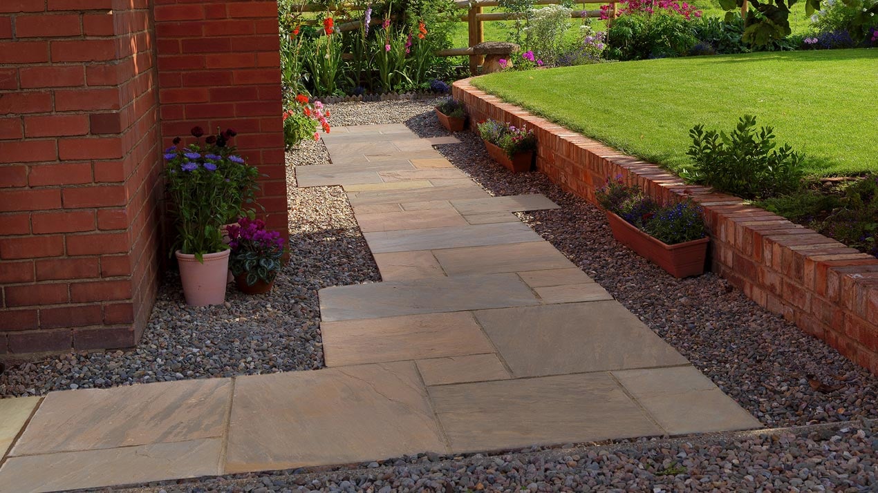 Standard jointed Raj Blend Sandstone pathway where the slabs have a hand-cut edge-profile.