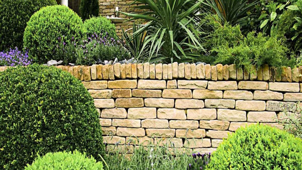 cottage garden wall made of stone