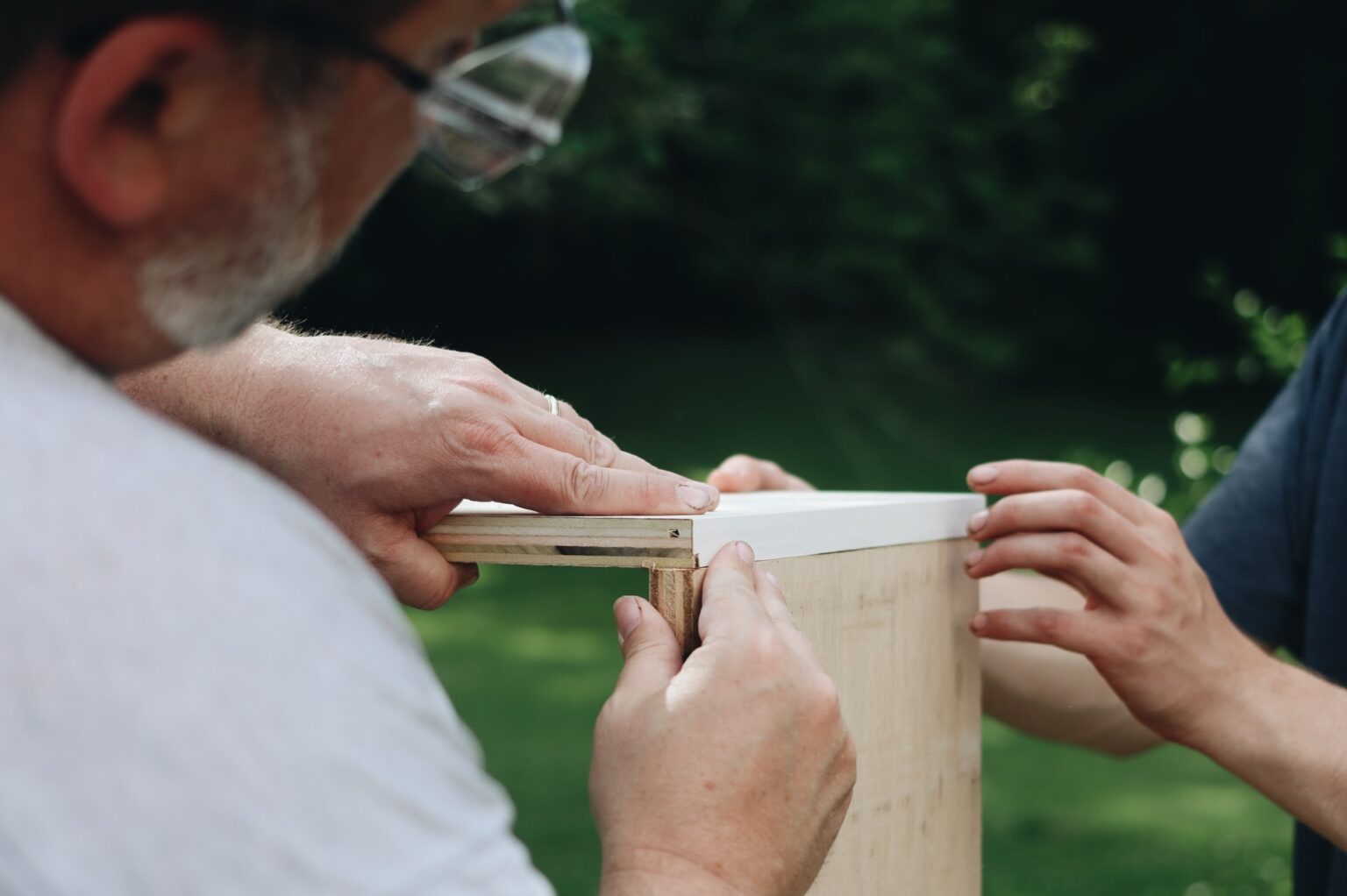 man making DIY shelf