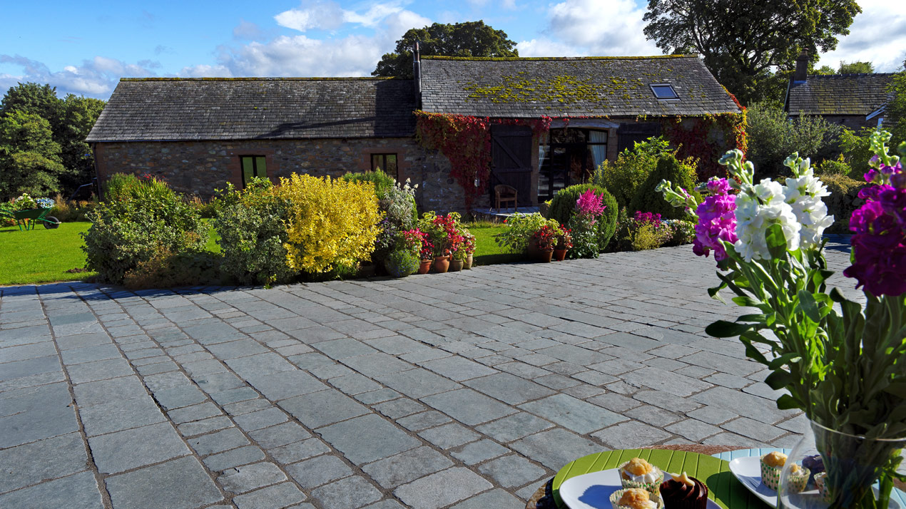 Denby Blue/Grey Limestone Cobbles Laid in a Stretcher Bond Pattern