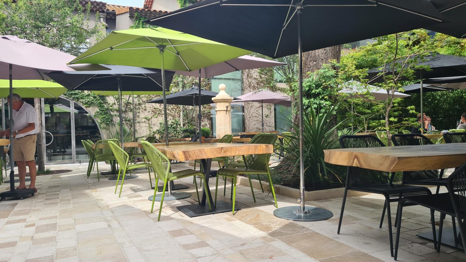 Courtyard dinning area André (chef Anne-Sophie Pic) - Maison Pic, Valence, France